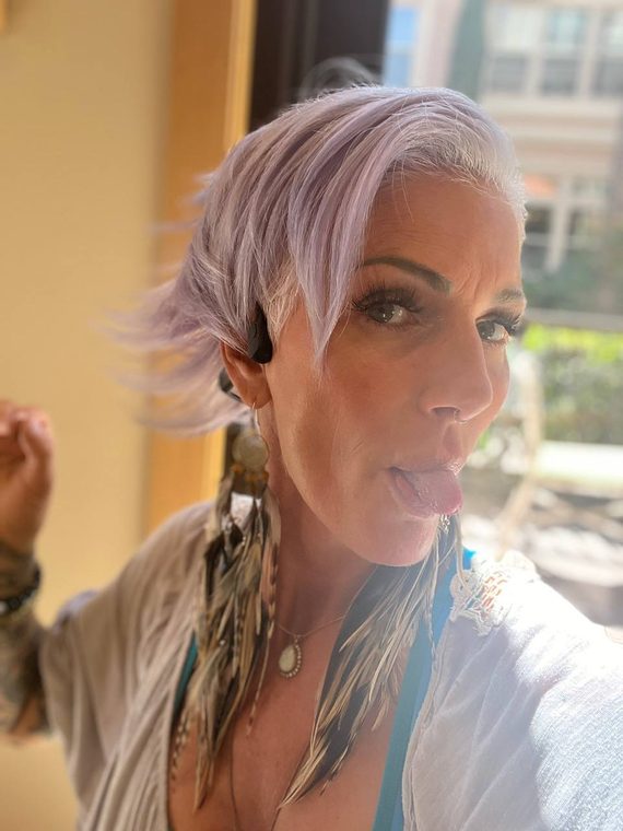 A silver-lilac pixie cut with a feathered fringe, coloured at Shear Lady Salon LLC