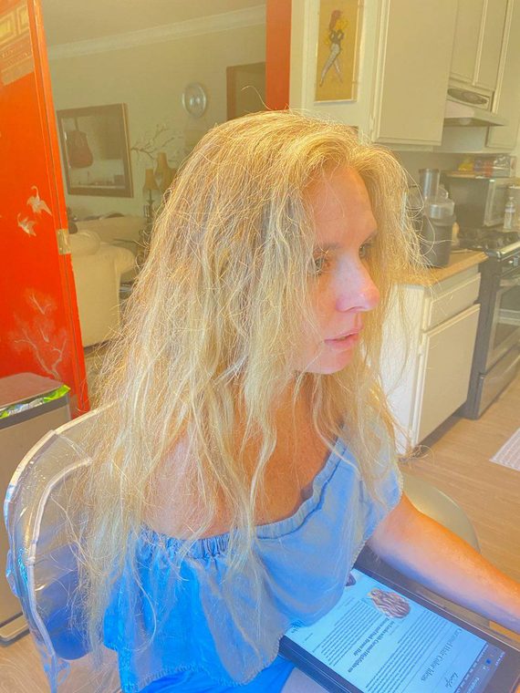 Long blonde hair before a colour appointment with Christal B.