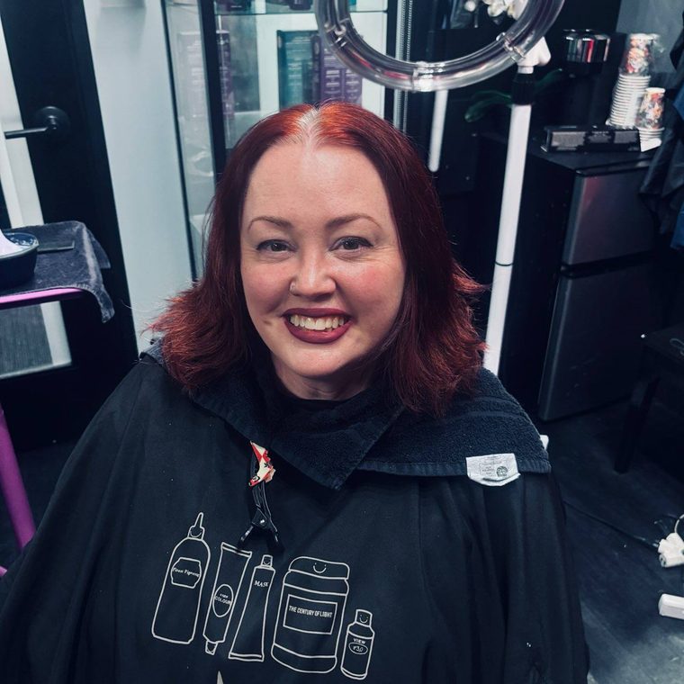 A deep red bob finished at Shear Lady Salon LLC