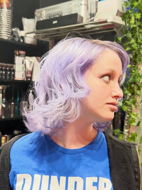 A lilac bob with a soft wave, coloured at Shear Lady Salon LLC